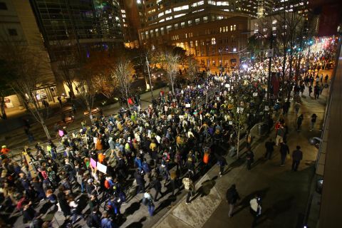Demonstrators march down Second Avenue in Seattle on November 9.