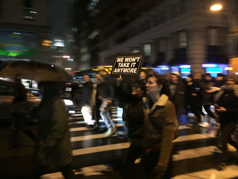 Thousands march down Fifth Avenue in New York on November 9. Authorities estimated as many as 5,000 people protested Trump's victory outside Trump Tower.