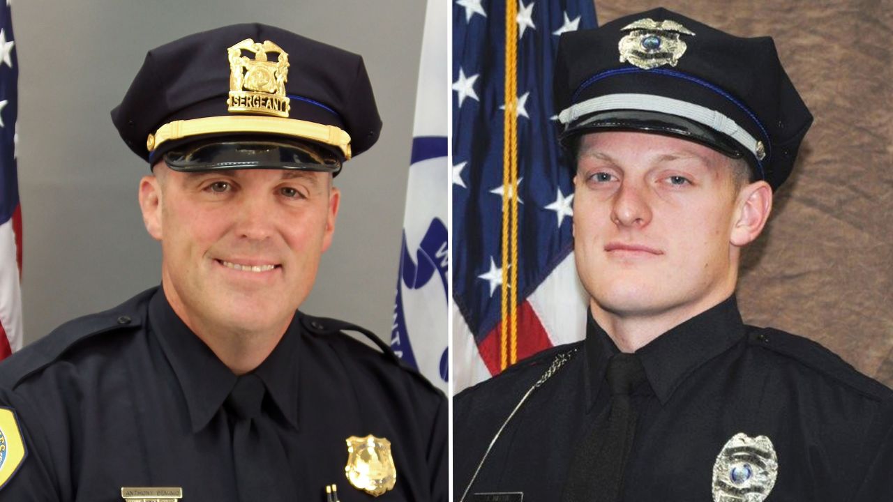 Des Moines police Sgt. Anthony Tony Beminio, left, and Des Moines police Officer Justin Martin