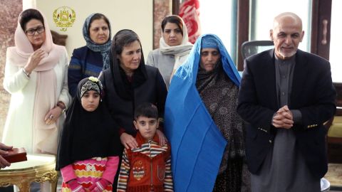  Afghanistan's President Ashraf Ghani met with Sharbat Gula, in blue, on Wednesday after she arrived in Kabul.