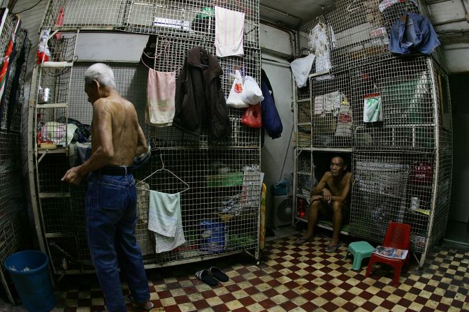 Hong Kong's notorious cage homes are tiny spaces divided by wire mesh or wooden planks.