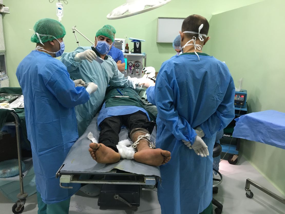 An injured man is treated at al Shikan hospital near Mosul.