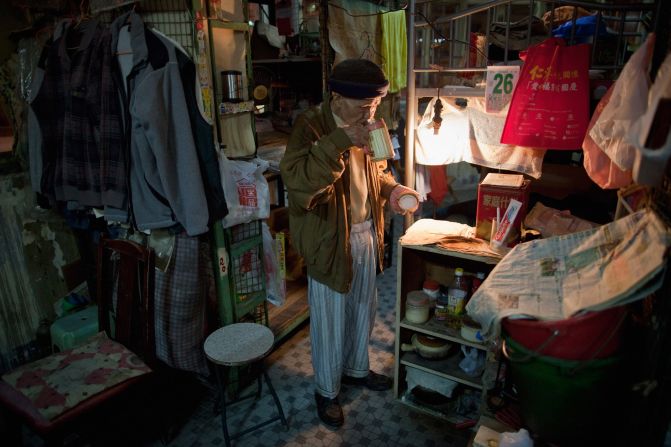 In this photo taken in 2010, 78-year-old cage home resident Leung Shu is pictured at his cage home. The apartment that the cage home is in houses four other people.