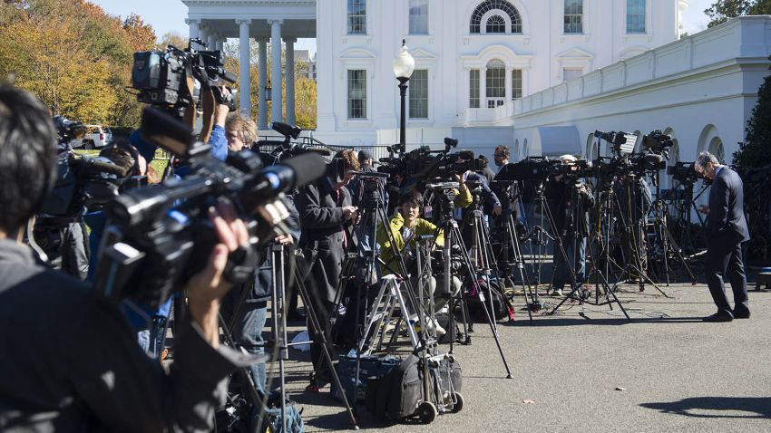 Members of the press await the arrival of US President-elect Donald Trump for a meeting with US President Barack Obama at the White House in Washington, DC, November 10, 2016.