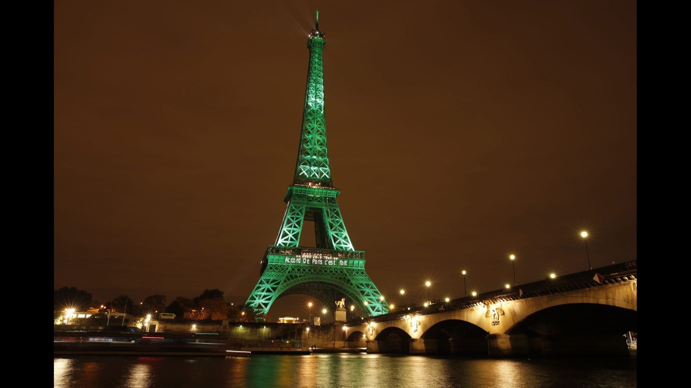 The Eiffel Tower is illuminated to celebrate the ratification of the COP21 climate change agreement in Paris on Friday, November 4. The agreement, <a href="http://www.cnn.com/2015/12/14/opinions/sutter-cop21-climate-5-things/" target="_blank">adopted by 195 countries in October</a>,  aims to reduce the world's fossil fuel emissions as well as keep the world's temperature increase "well below" 2 degrees Celsius.