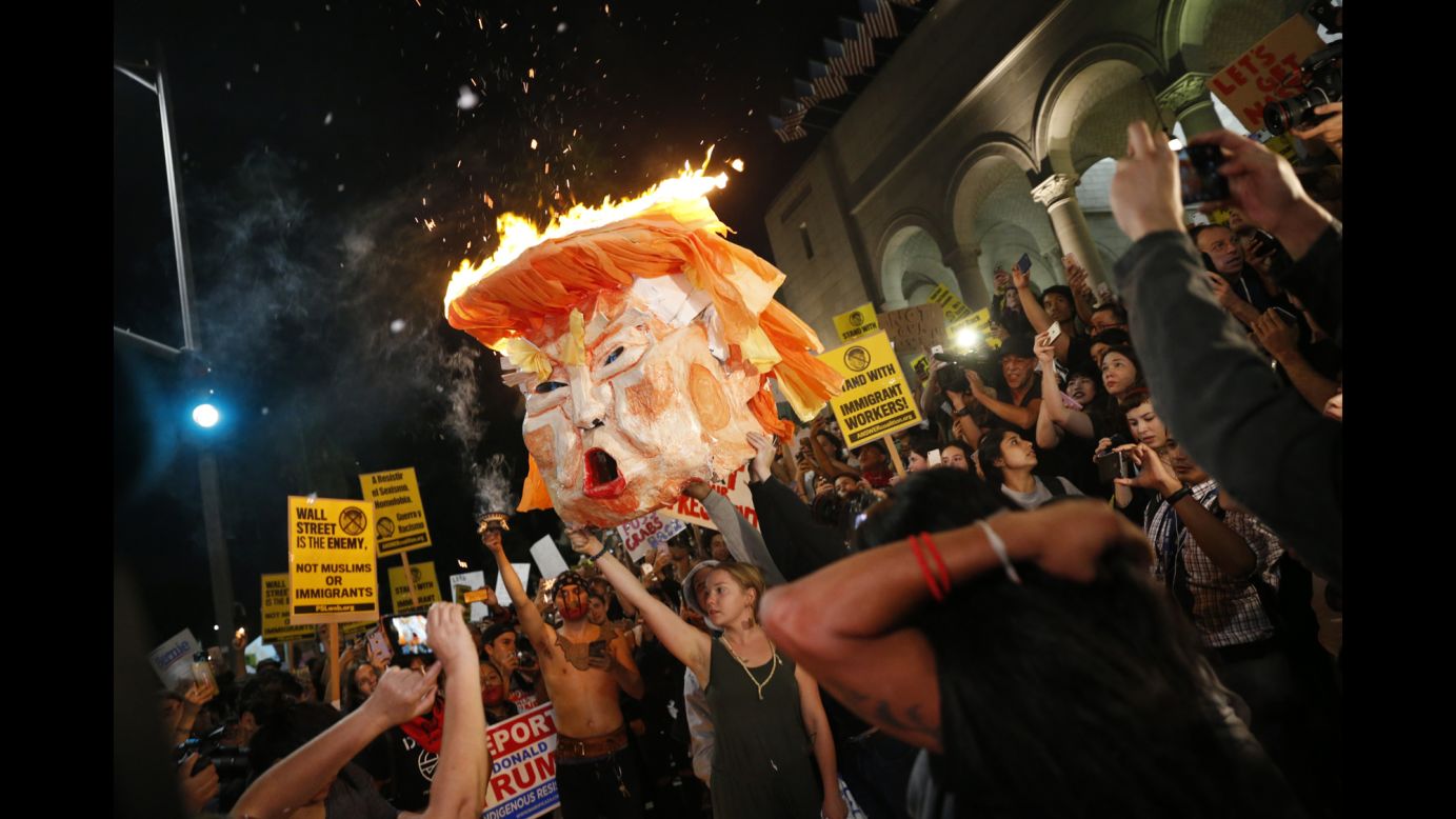 Protesters set an effigy of Donald Trump afire outside Los Angeles City Hall on Wednesday, November 9. <a href="http://www.cnn.com/2016/11/10/politics/election-results-reaction-streets/index.html" target="_blank">Tens of thousands rallied in at least 25 US cities</a> to protest Trump's unexpected victory in the divisive 2016 presidential election. Dozens were arrested. 