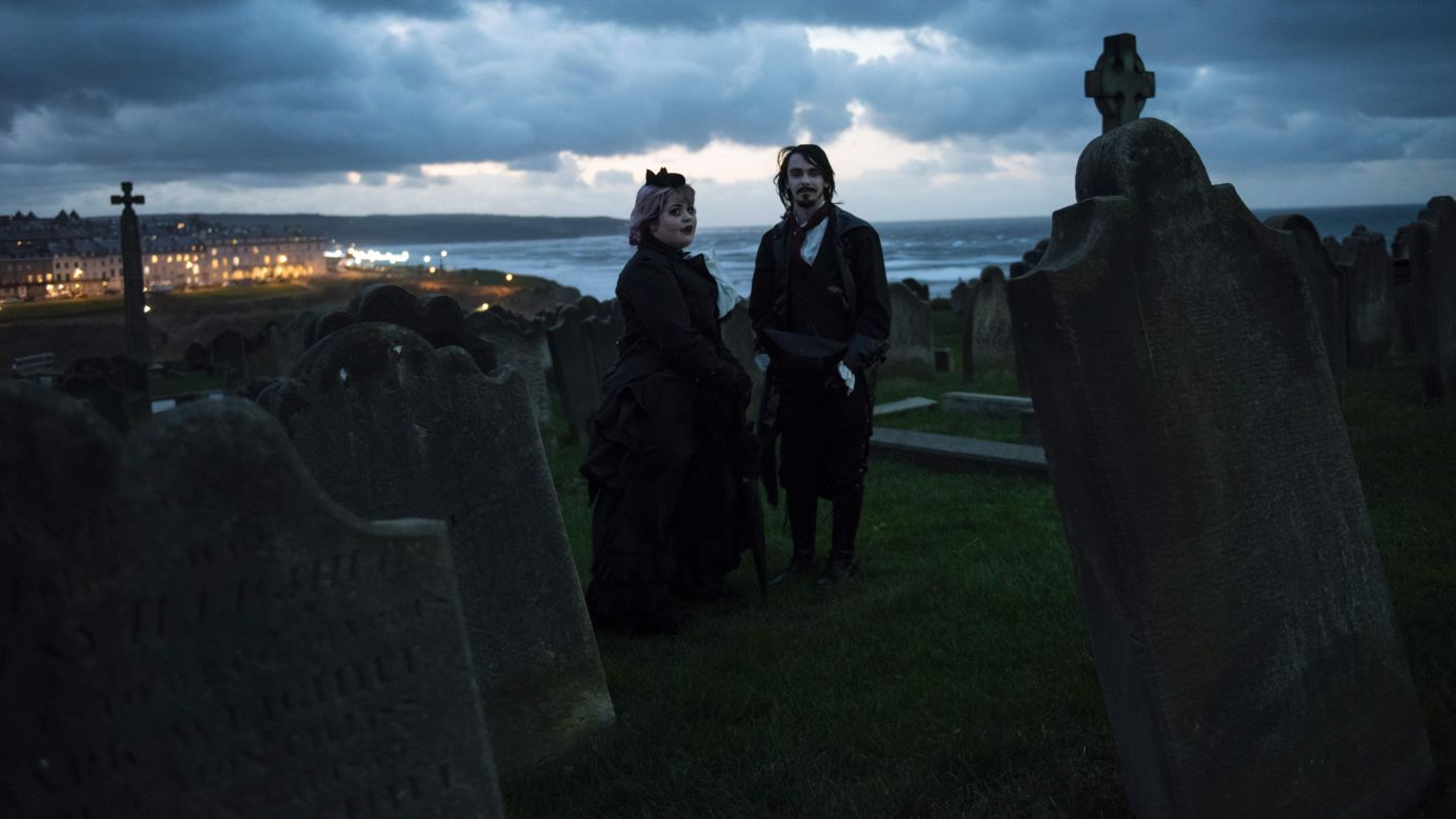 People attend the Whitby Goth Weekend festival in Whitby, England, on Sunday, November 6. The biannual music event brings together thousands of goths and alternative lifestyle fans from the United Kingdom and around the world. 