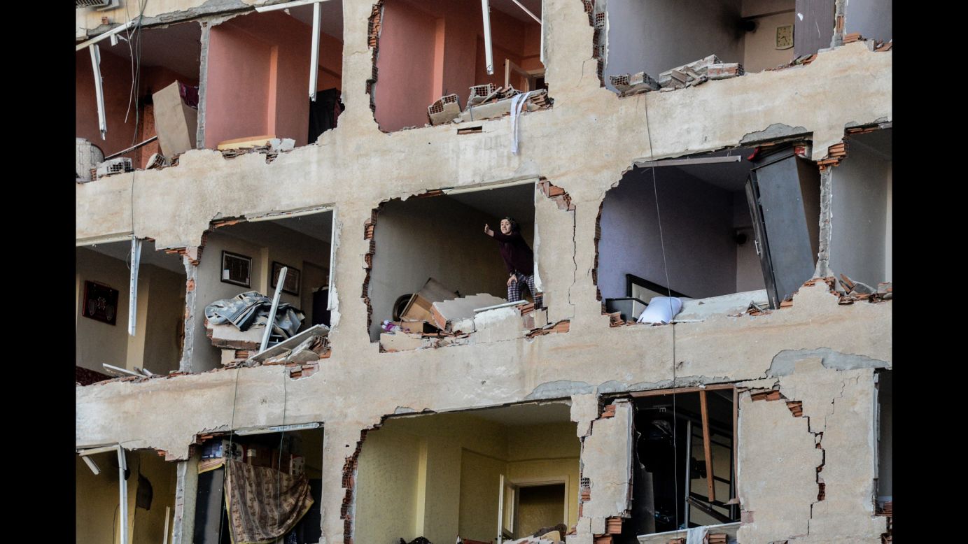 A woman reacts in her damaged apartment after an explosion in Diyarbakir, Turkey, on Friday, November 4. <a href="http://www.reuters.com/article/us-turkey-security-blast-idUSKBN12Z0G2?il=0" target="_blank" target="_blank">According to Reuters</a>, Kurdish militants set off a car bomb, killing eight people and wounding more than 100.