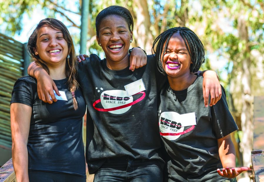 In March 2019, South Africa will launch the continent's first private satellite into space. It's been designed by school girls, within a STEM program. Pictured: Ayesha Salie, Sesam Mngqengqiswa, and Bhanekazi Tandwa on a learning boot camp with fellow teammates  in Worcester, Western Cape Province, South Africa.