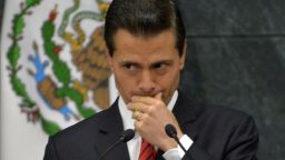 Mexico's President Enrique Pena Nieto gestures as he delivers a message to the media about US presidential candidate Donald Trump's triumph at "Los Pinos" presidential residence on November 9, 2016 in Mexico City. / AFP / PEDRO PARDO        (Photo credit should read PEDRO PARDO/AFP/Getty Images)
