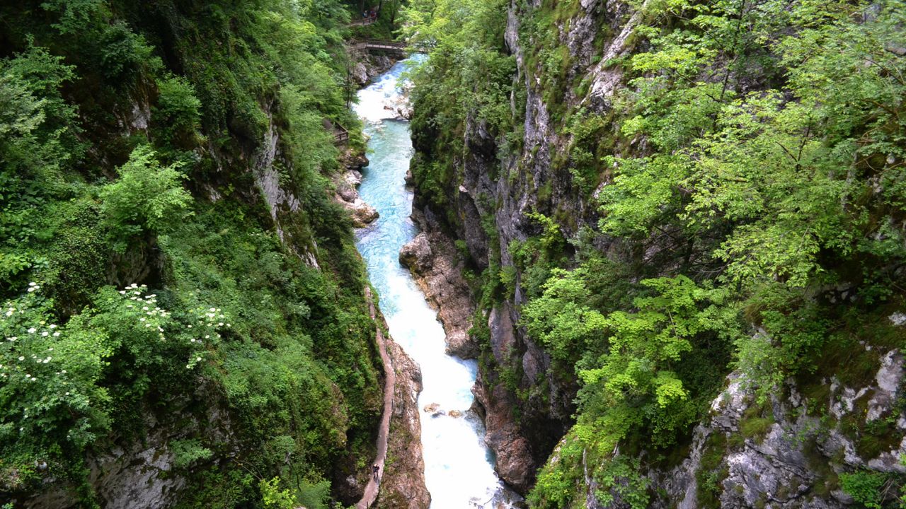 Triglav National Park is known for breathtaking views of aquamarine waters and rapids running through limestone gorges.