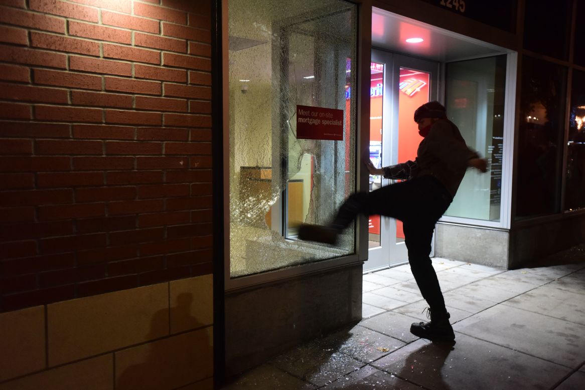 A protester kicks the window of a Bank of America branch in Portland, Oregon, on November 10. What started out as a peaceful march with more than 4,000 people <a href="http://www.cnn.com/2016/11/11/us/oregon-protest-riot/index.html" target="_blank">quickly turned violent.</a> Portland police publicly declared a "riot" because of "extensive criminal and dangerous behavior," according to posts on the department's Twitter page.