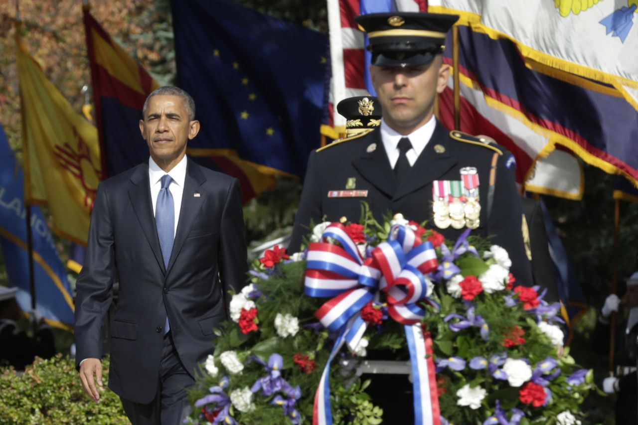 President Barack Obama participates in a wreath-laying ceremony at the Tomb of the Unknown Soldier on November 11.
