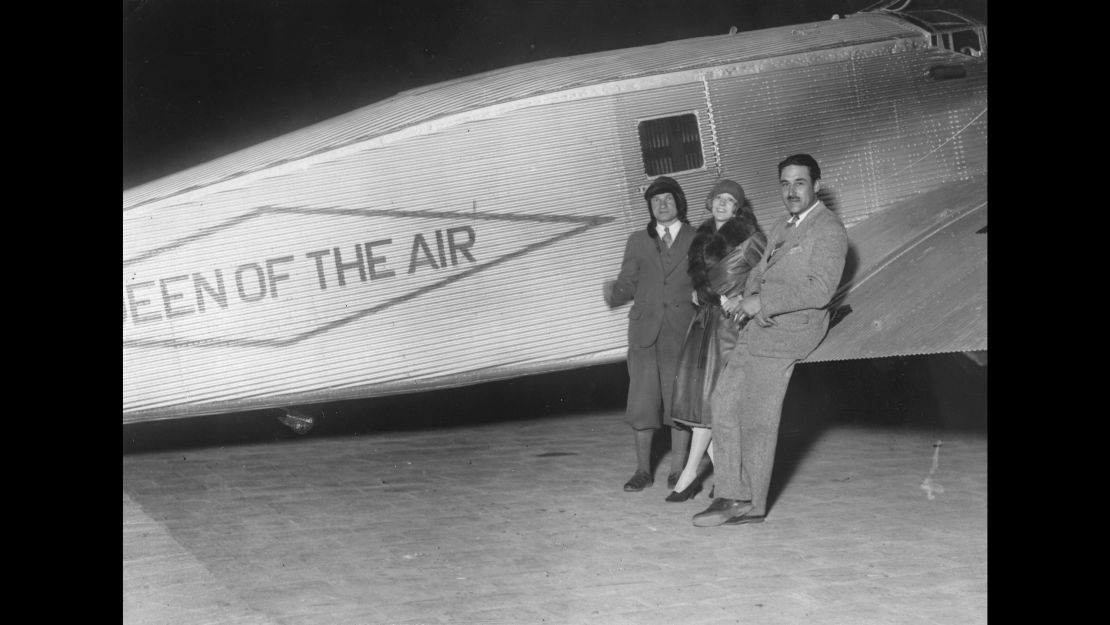 Pilots Charles A. Levine, Mabel Boll and Bert Acosta at the Le Bourget airport with  The Queen of the Air, on January 1928. Boll wanted to use it to fly across the Atlantic, but Amelia Earhart beat her to it later that June. 