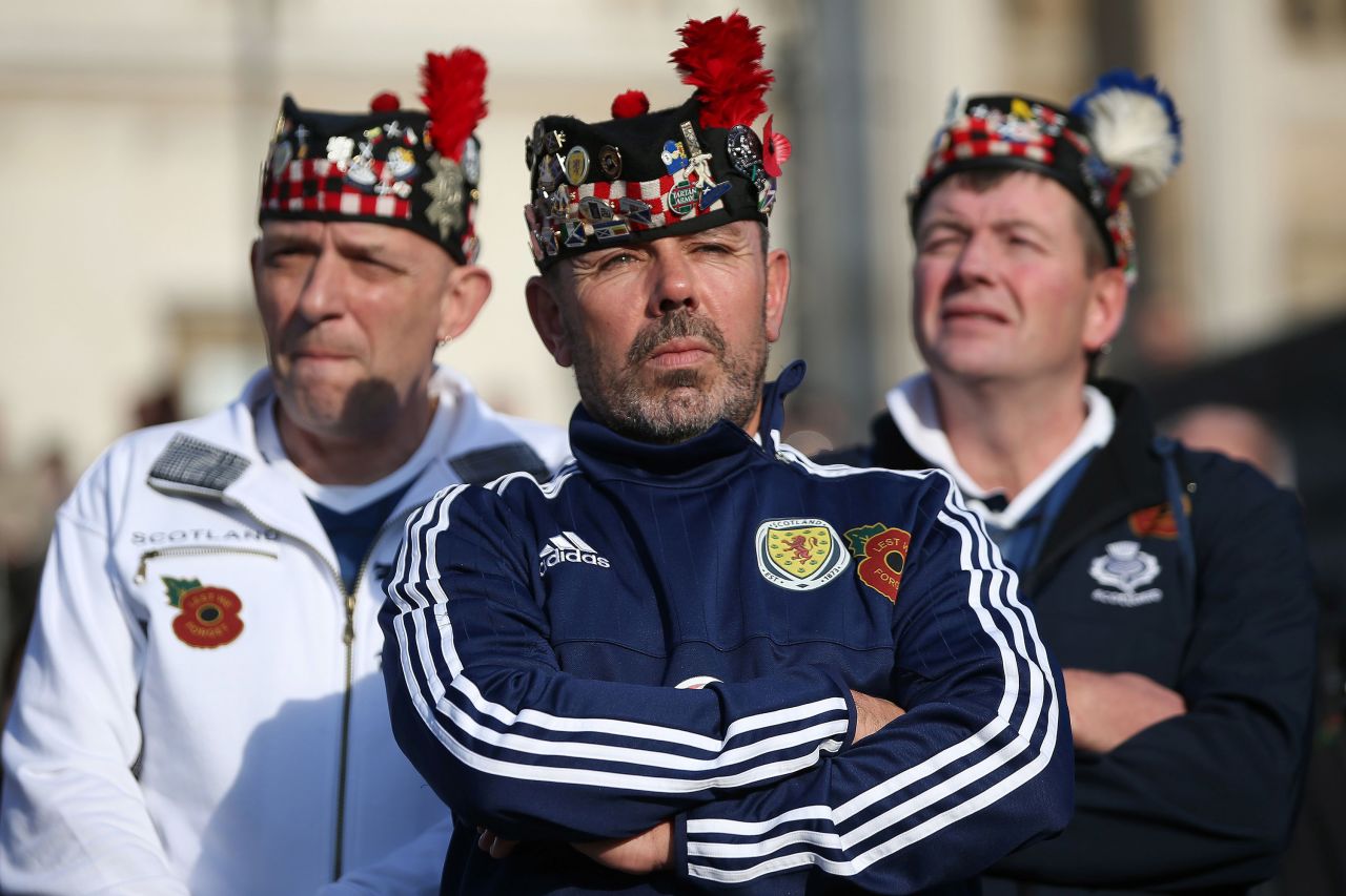 Scotland football fans stand in London's Trafalgar Square as they wait to observe two minutes of silence in honor of Armistice Day on November 11.