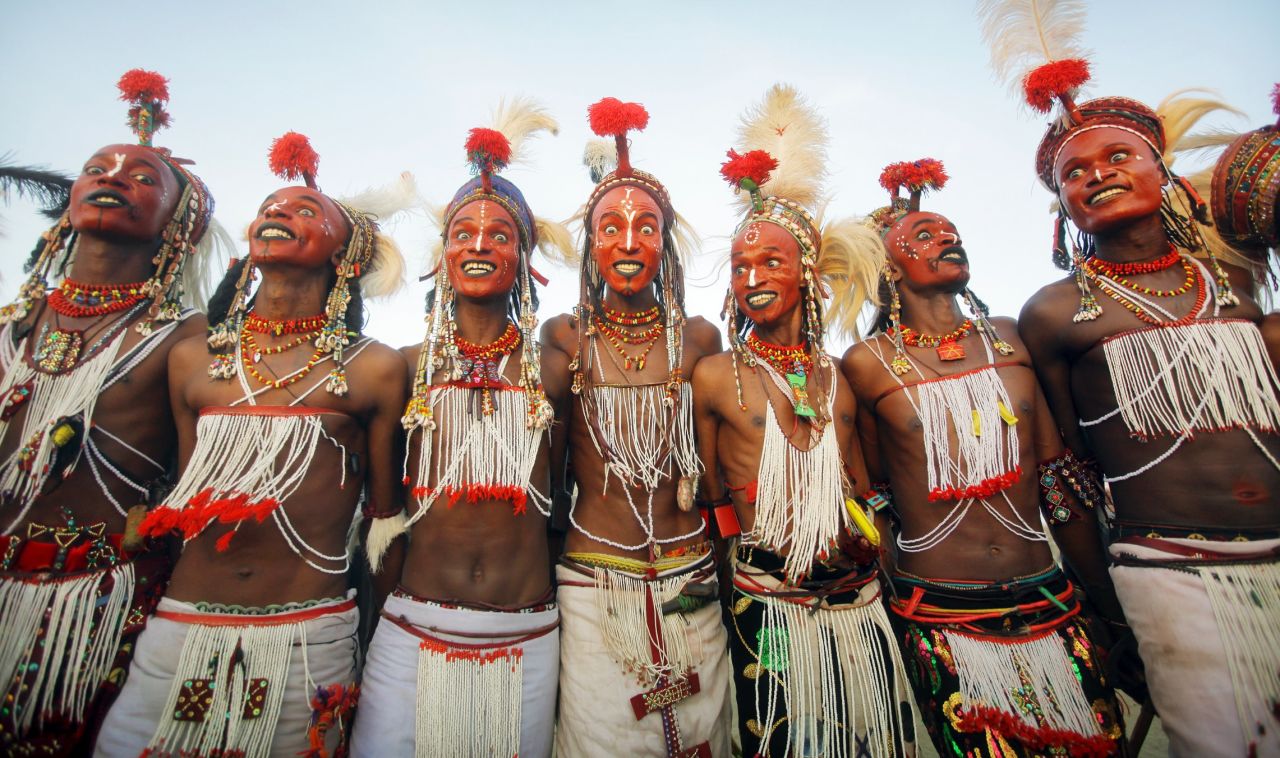 At the end of the rainy season near Lake Chad, northern Niger, Wodaabe people come together for <em>Cure Salee</em>, the "Festival of Nomads." At the center of celebrations is <em>Gerewol</em>, a male beauty contest and courtship ritual. Young men -- traditionally herdsmen -- wear full makeup, jewelry and their finest clothes and stand in line to await inspection by female onlookers. White teeth and white eyes are highly prized, so participants will grin broadly and pull all manner of expressions in the hope of attracting attention. It's flirtation <em>en masse</em>, in the hope of winning a night of passion with one of the judges.