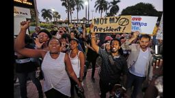Demonstrators chant during a protest in opposition of President-elect Donald Trump, Friday, Nov. 11, 2016, at Bayfront Park in Miami. (Al Diaz/Miami Herald via AP)