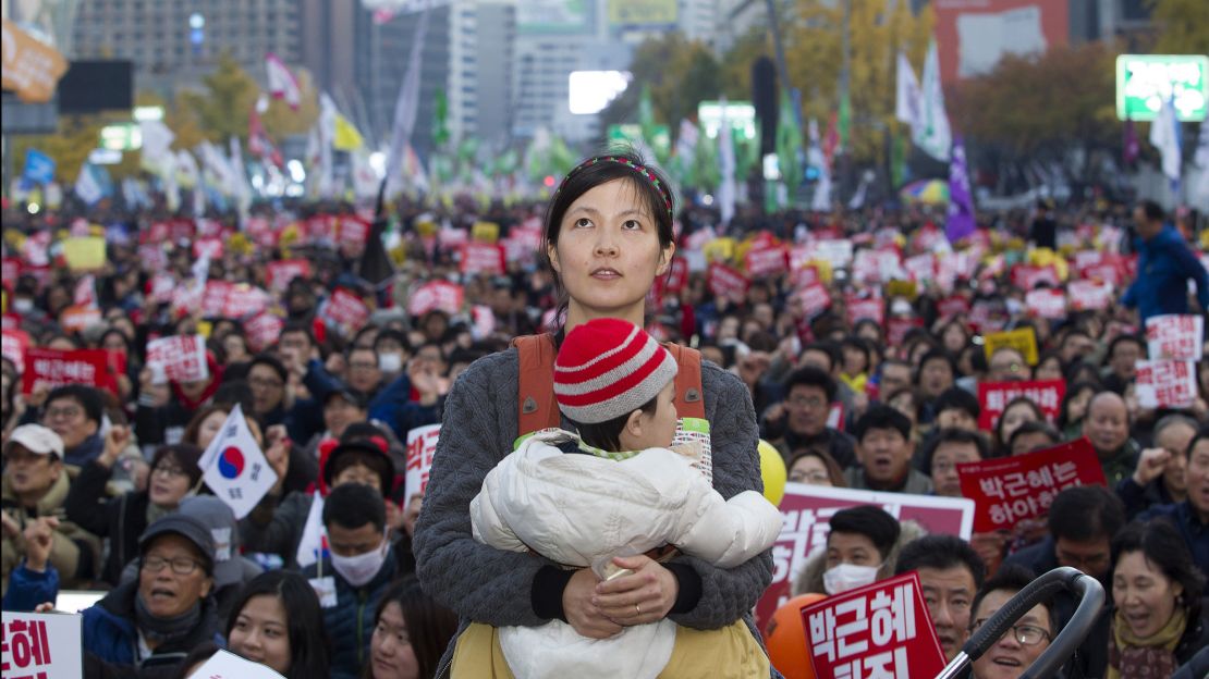 Songs and speeches are a part of Saturday's protests in downtown Seoul.