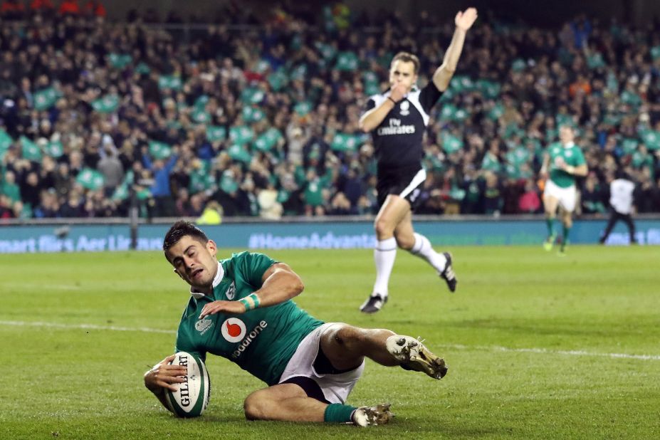 Ireland's full-back Tiernan O'Halloran scores his team's third try during the contest with Canada.