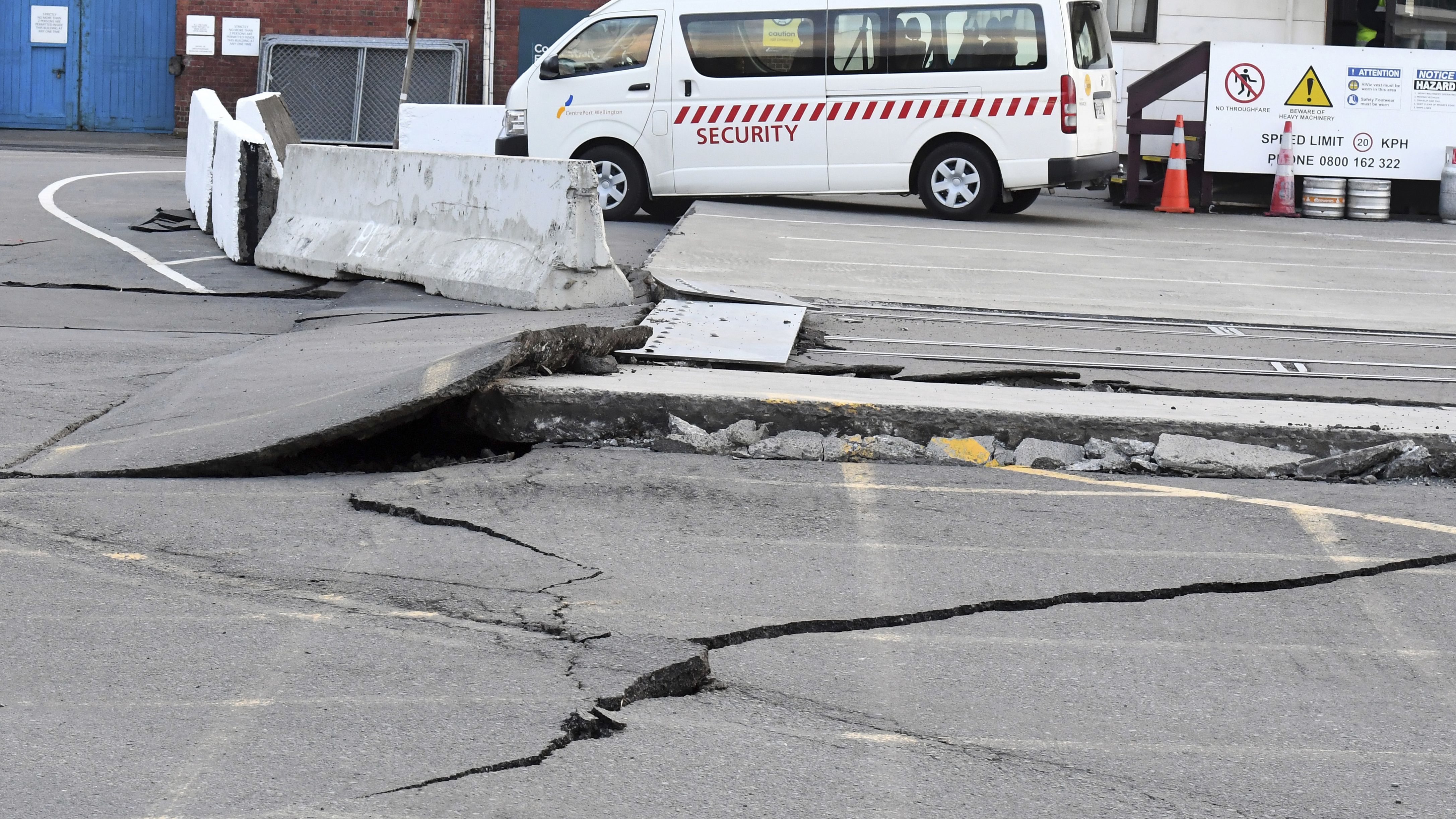 Fissures run along a road by the Centre Port in Wellington, Monday, November 14 after a 7.8 magnitude earthquake struck New Zealand's south Island early in the morning.
