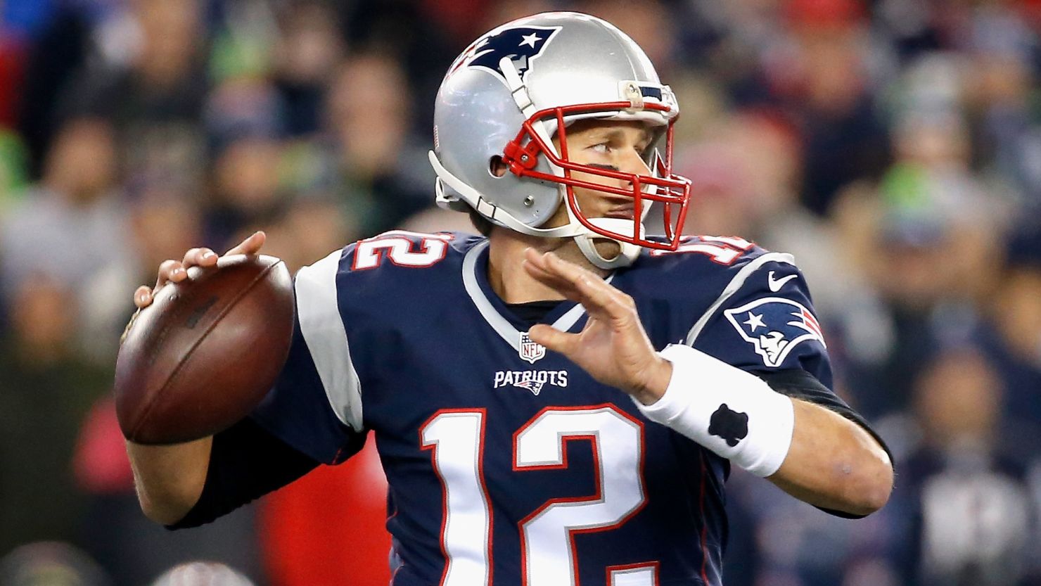 The Patriots' Tom Brady is just one of the fabulous four quarterbacks taking the field in the championship games Sunday.