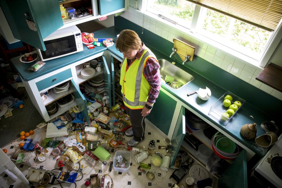 Mary Kimber surveys the damage in her kitchen after the quake in Waiau on November 14.