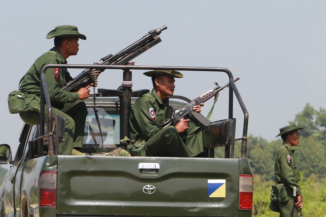 Heavily armed Myanmar army troops patrol Kyinkanpyin area in Maungdaw town, Rakhine State October 16, 2016.

