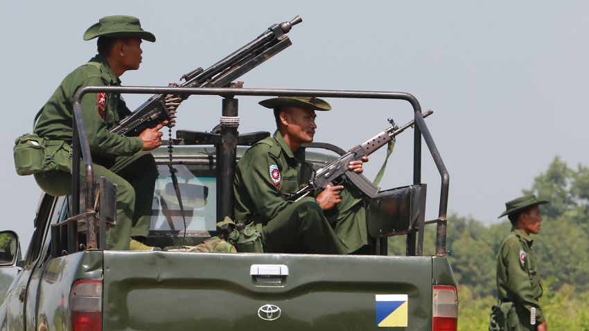 Heavily armed Myanmar army troops patrol Kyinkanpyin area in Maungdaw town located in Rakhine near the Bangladesh border on October 16, 2016.
Three police officers were attacked with machetes in restive northwestern Myanmar on October 15 by assailants who were shot dead, the military has said, amid lethal violence that authorities have blamed on homegrown Islamist insurgents. Security forces have killed at least 29 people since attacks were launched the previous week on police posts along the Bangladesh border, according to state media. / AFP / KHINE HTOO MRAT        (Photo credit should read KHINE HTOO MRAT/AFP/Getty Images)