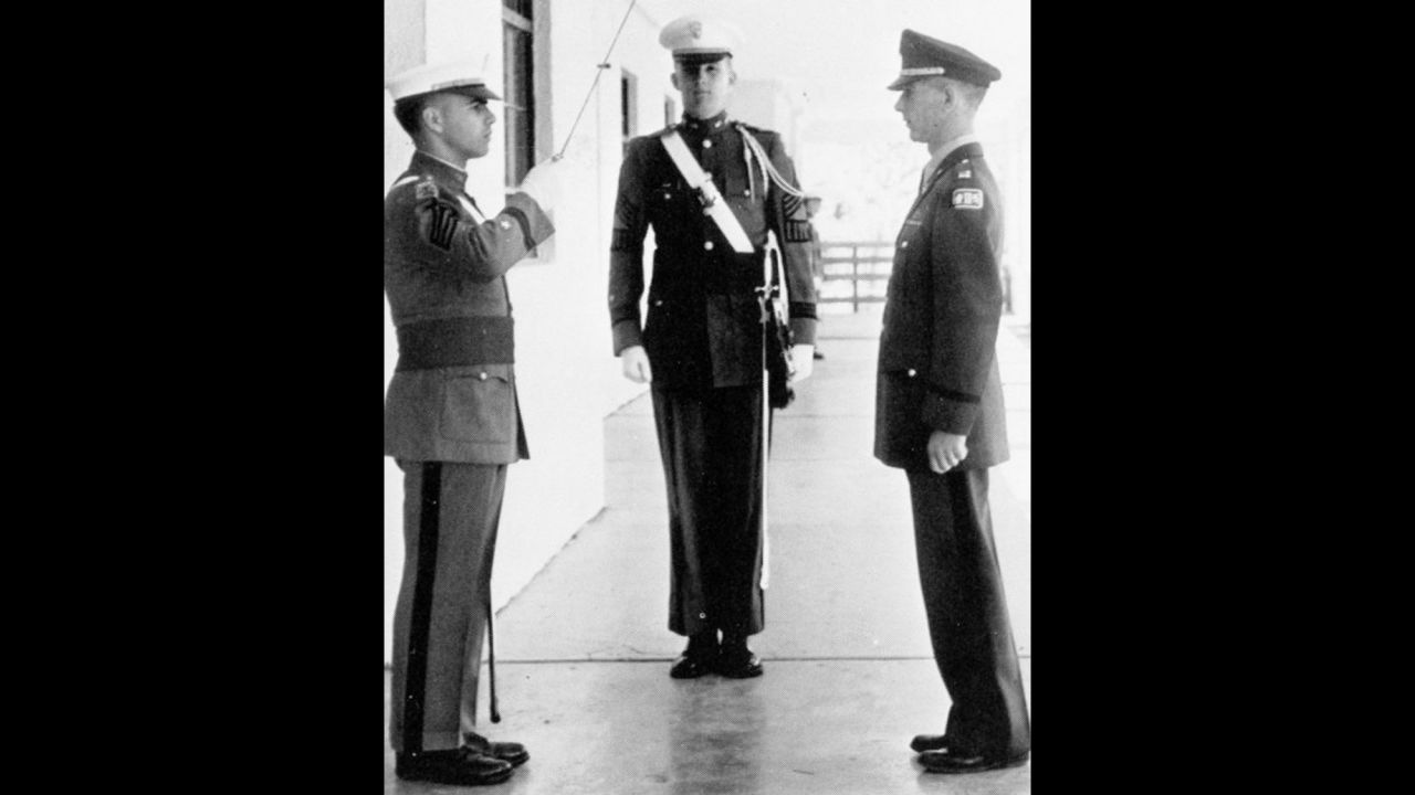 Trump, center, stands at attention during his senior year at the New York Military Academy in 1964.