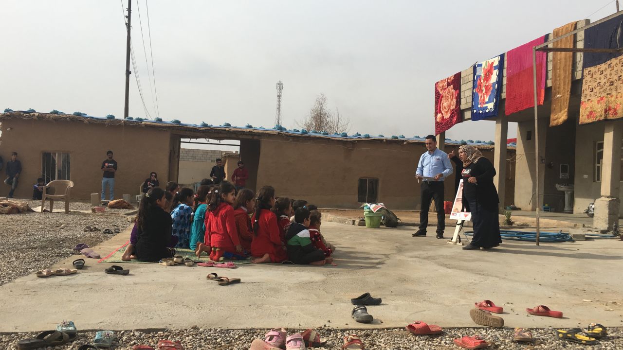 Children are taught how to avoid booby traps set by ISIS.