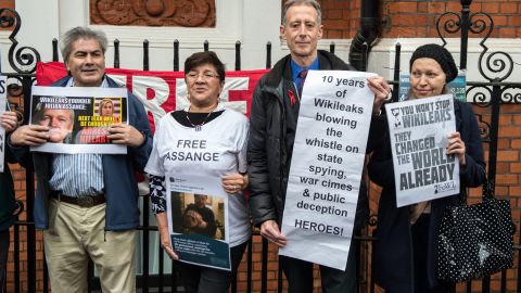 Supporters of Julian Assange gather outside Ecuador's Embassy in London Monday.