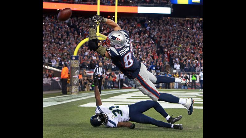 New England tight end Rob Gronkowski can't catch a 4th-and-1 pass late in the NFL game against Seattle on Sunday, November 13. He was defended by Kam Chancellor, bottom, on what was the Patriots' last offensive play of the game. Seattle won 31-24.