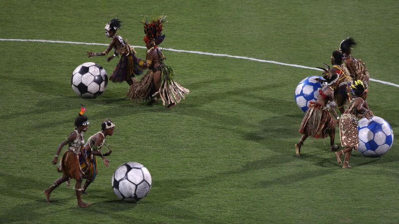 Performers push soccer balls during the opening ceremony of the Under-20 Women's World Cup on Sunday, November 13. The tournament is taking place in Papua New Guinea.