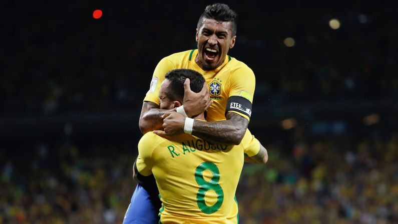 Brazilian soccer players Paulinho and Renato Augusto celebrate Paulinho's goal against Argentina on Thursday, November 10. Brazil defeated its rival 3-0 in the World Cup qualifier, which was played in Belo Horizonte, Brazil.