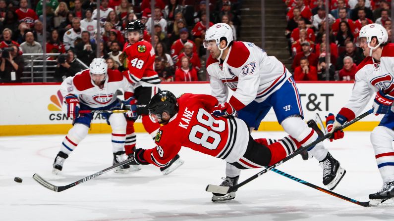 Chicago's Patrick Kane falls over as he scores <a href="index.php?page=&url=https%3A%2F%2Fwww.nhl.com%2Fvideo%2Fkanes-spectacular-deke-and-goal%2Ft-277443702%2Fc-46330503" target="_blank" target="_blank">a spectacular goal</a> against Montreal on Sunday, November 13.