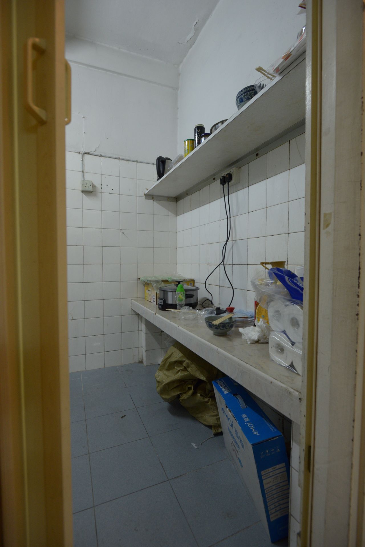 A basic kitchen shared by tenants