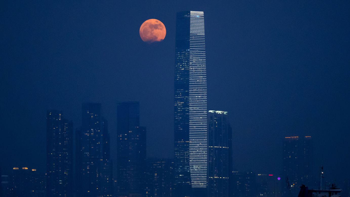 The moon rises over Victoria Harbour in Hong Kong on November 14. A supermoon occurs when the moon becomes full on the same days as its perigee, which is the point in the moon's orbit when it is closest to Earth. Supermoons generally appear to be 14% bigger and 30% brighter than other full moons.