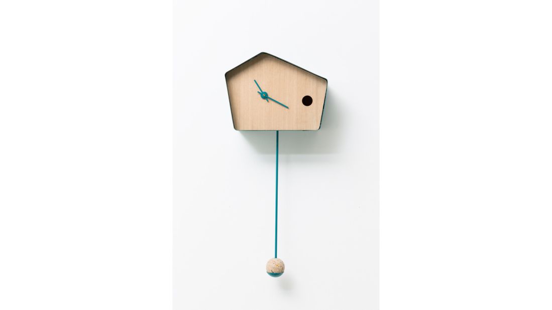 The solar-powered Coucou-Nest has a ball of birdseed on its pendulum to attract real birds, who can make their homes inside the clock itself. 