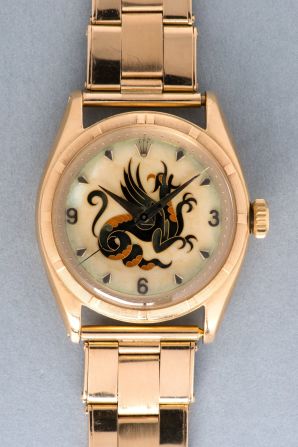 A close-up of the "The Dragon" watch, which was made by Rolex, shows its distinctive motif. 