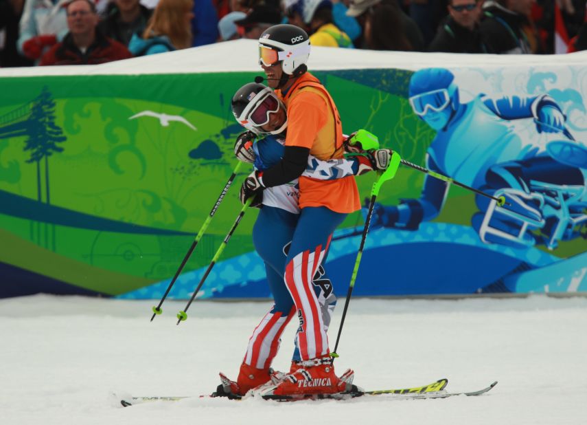 "I didn't start living my life until I started sport. And sport has given me the life that I love and enjoy," Danelle says. Pictured, Danelle and Rob celebrate at the 2010 Vancouver Winter Paralympics.