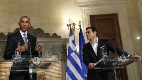 Obama and Greek Prime Minister Alexis Tsipras field questions at a joint news conference in Athens on November 15.