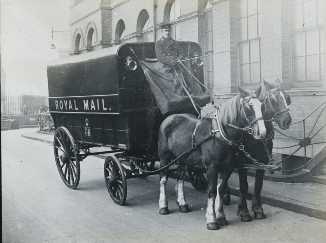 Royal Mail horse-drawn mail coach c.1910.