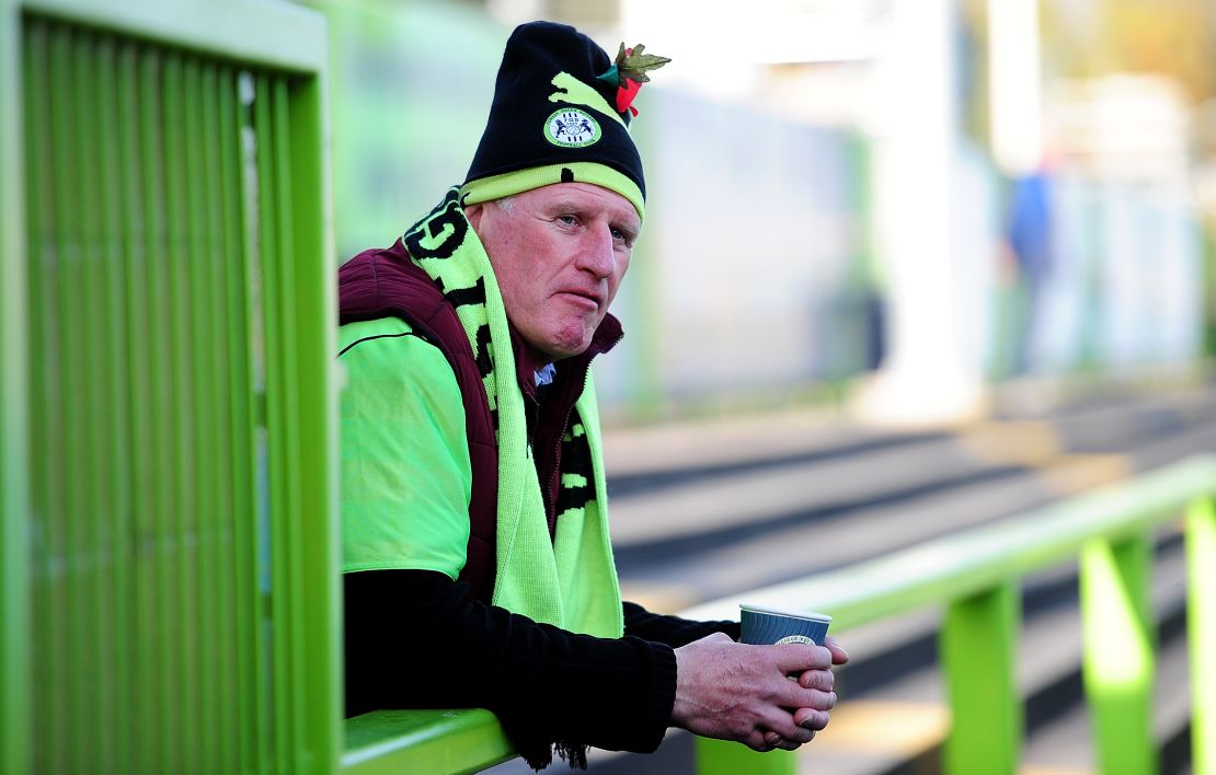 A Forest Green fan in the club's neon green colors. 