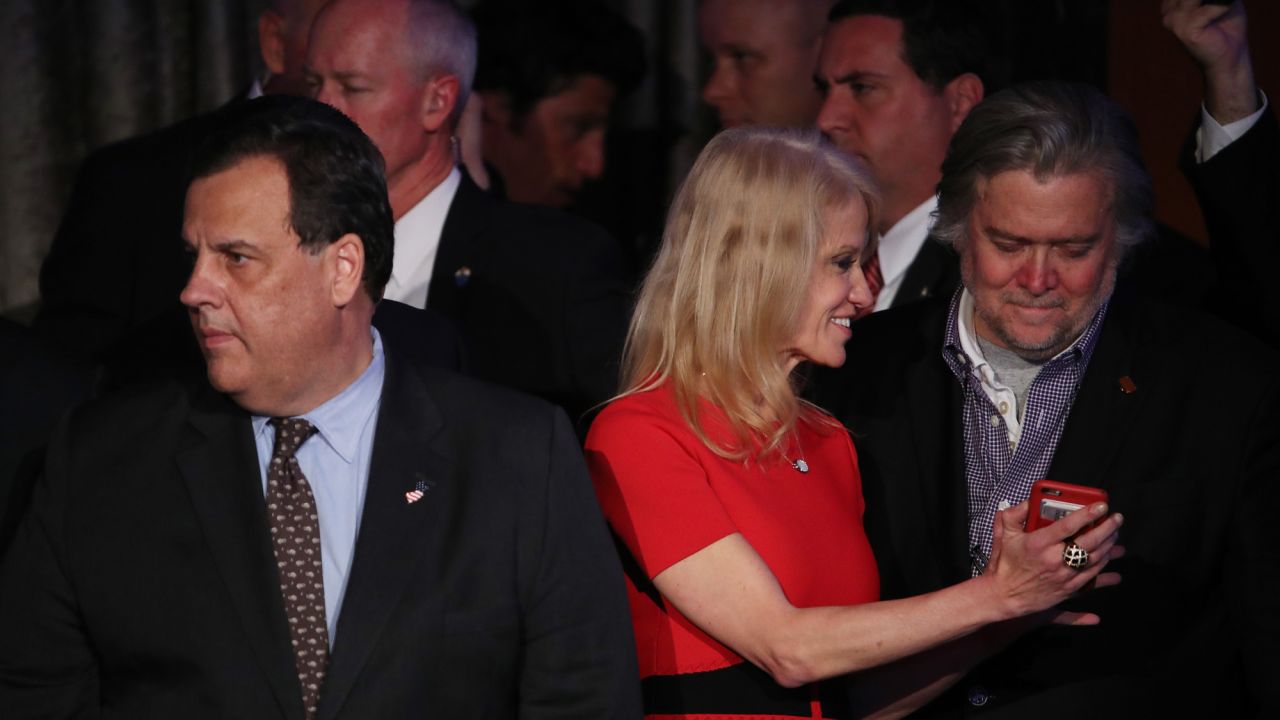 Former New Jersey Gov. Chris Christie, left, stands on stage with Bannon and Trump campaign manager Kellyanne Conway during a Trump election-night event in New York in November 2016.
