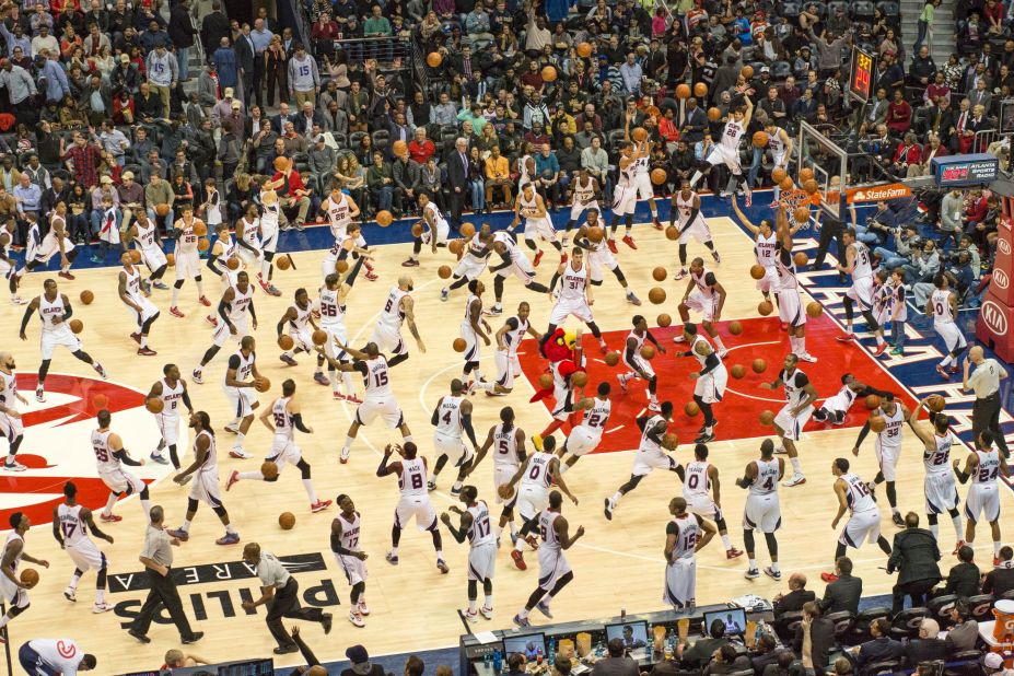 No, this isn't the world's most intense basketball practice. Pelle Cass took countless images of the same basketball game, and created a composite using only players from one team, repeated over and over. 