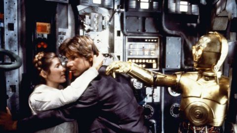American actors Carrie Fisher, Harrison Ford and British Anthony Daniels on the set of Star Wars: Episode V - The Empire Strikes Back directed by Irvin Kershner. (Photo by Lucasfilm/Sunset Boulevard/Corbis via Getty Images)