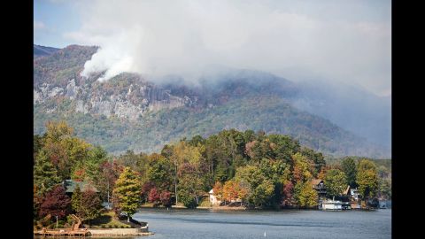 Smoke from the Party Rock fire spreads near Lake Lure on Wednesday, November 9.