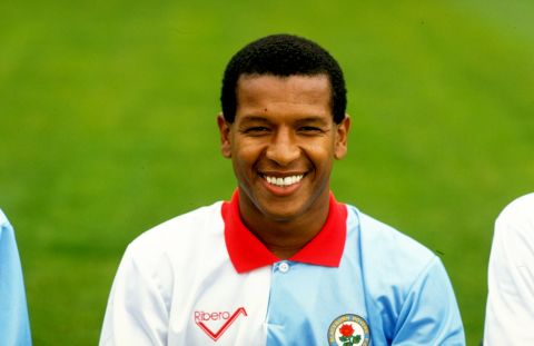 Howard Gayle played for eight English football clubs, and was the first black player to play for Liverpool. Gayle says he tried to educate teammates on acts of passive racism. During his playing days he did not sing the national anthem, and later refused an MBE (Member of the Most Excellent Order of the British Empire) title from Buckingham Palace.
