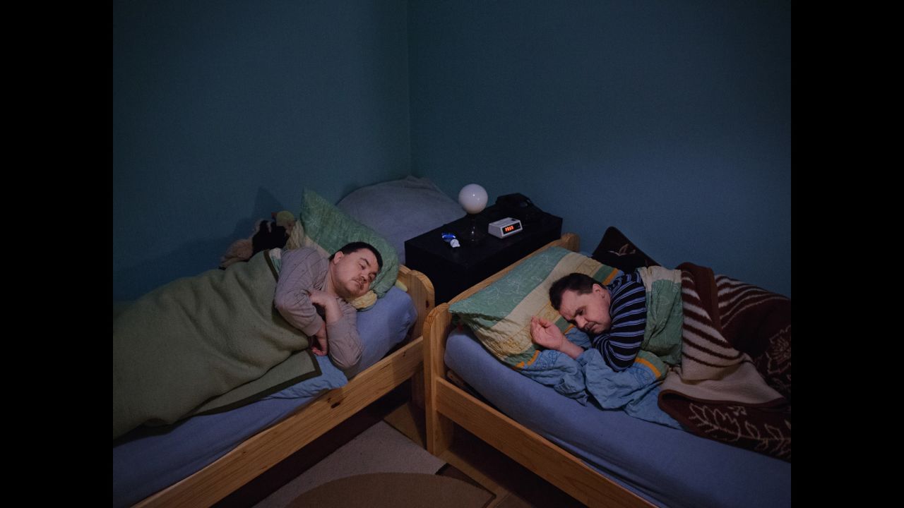 Twin brothers Jörg and Rolf Fischer sleep together at Rolf's dormitory in Germany. Both were born deaf, and they have lost their eyesight because of diabetes -- although Rolf can still see a little bit out of one eye. Photographer Marlena Waldthausen spent a few months with the twins and learned how they navigate the world together.