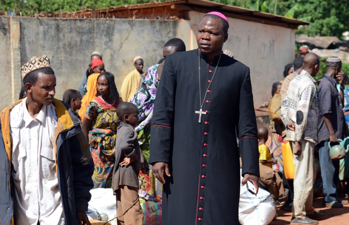 Dieudonne Nzapalainga meets Muslims who fled militia attacks at a center for displaced people in 2014.